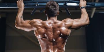 Man Doing Back Exercise In Gym
